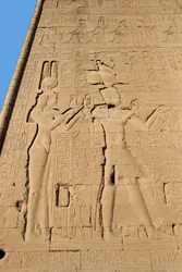 Egyptian antiquity: relief from the back wall of the temple dedicated to the goddess Hathor representing Cleopatra and Caesarion. Denderah, Egypt