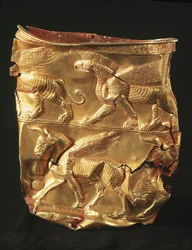Beaker decorated with winged bull and monsters with eagle heads, from Marlik, Iran
