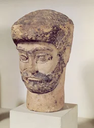 Head of a beaded man