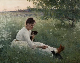Girl with cats in a summer landscape