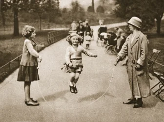 A girl skipping in Hyde Park or Kensington Gardens, from Wonderful London, published 1926-27