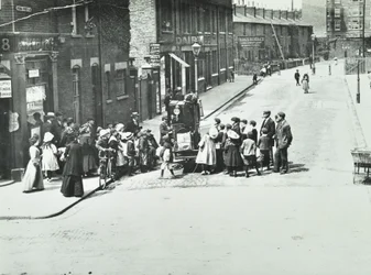 A Street Organist in Putney, London, 1886