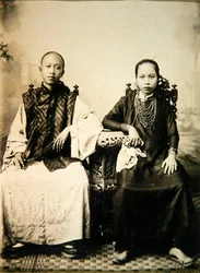 Annamite boy and girl in central Vietnam, c.1875