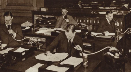 Businessmen Dictating Letters Using Ediphones
