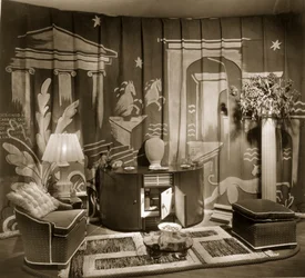 Decorative trade stand at Dorland Hall with hanging textile, 1940s