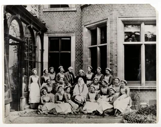 Florence Nightingale with Sir Harry Verney and Miss Crossland, in the centre of a group of nurses at Claydon House, 1886