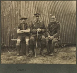 Group of three soldiers outside a Nissan hut, c.1914-18
