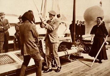 King Edward VIII Testing a Japanese Fencing Helmet, 1922