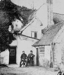 Two Men Outside Enfield Cottage, c.1890