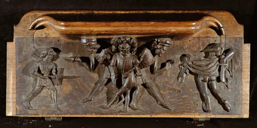 A damaged misericord depicting three men fighting with daggers and swords, New College Chapel, Oxford, late 14th century