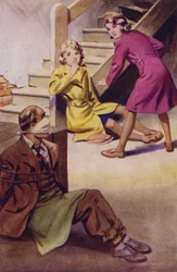 A man bound, gagged and sitting on the floor while two girls look on
