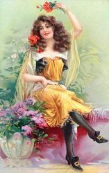 A seated young woman with flowers in her hair