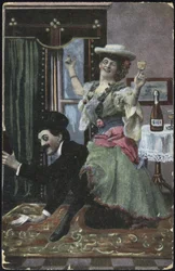 A well-dressed couple laughing