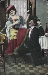 A well-dressed couple laughing