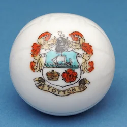 Armorial souvenir miniature football with transfer of the Totton crest (ceramic)