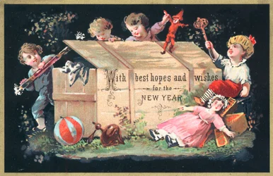 Children taking toys out of wooden chest