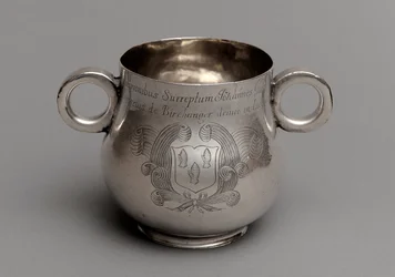 Cup with large belly and thick cast rim base, and a pair of ox-eye handles, 1675
