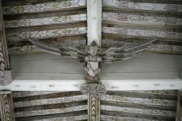 View of one of the carved wooden angels in the nave