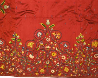 (detail) of an important skirt or petticoat of crimson silk said to have been embroidered by Mary, Queen of Scots for Queen Elizabeth I while she was captive at Hardwick