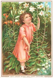 Girl smelling lilies in the garden