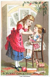Girl talking to young child in high chair