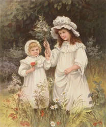 Girls picking flowers in a meadow