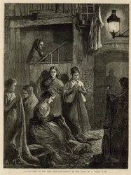 London Life at the East End - Sack-Making by the Light of a Street Lamp