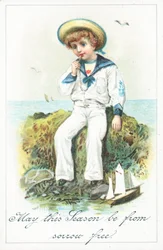 Sailor Boy sitting on rocks