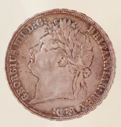 Silver English Crown, Reign of King George IV (1820-1830). Diam. 3.7 cm Naples, Museo Archeologico
