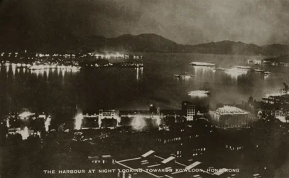 The Harbour at night looking towards Kowloon, Hong Kong, from an album of photographs relating to the service of Pte H. Chick, 1940