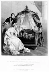 The Princess Royal, Her Majesty the Queen and HRH Prince Albert, with the royal cot