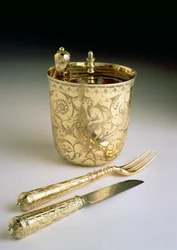 Travelling set of a knife, fork, spoon and beaker