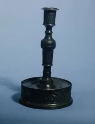 William Grainger candlestick with relief cast decoration, dated 1616