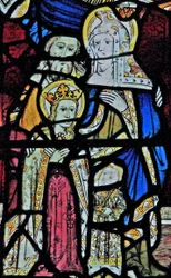 Window Ew depicting St Anne, Joachim, the Virgin Mary and the Christ Child