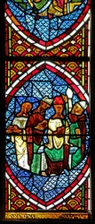 Window depicting a scene of the Mass