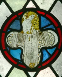 Window depicting a musician angel with a rebec
