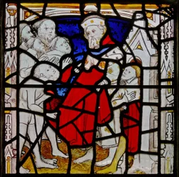 Window N4 depicting the Works of Mercy: clothing the naked