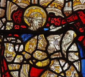 Window depicting the Charity of St Martin: he divides his cloak