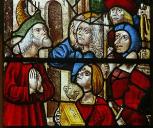 Window depicting a scene from a legend of St Nicholas: thieves return the treasure they stole to the rich man