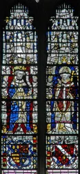 Window depicting figures and shields below