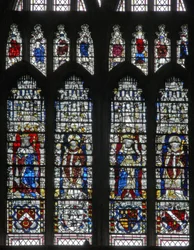 Window depicting figures and shields below