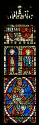 Window depicting two saints and heraldic shields