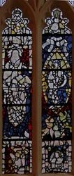 Window depicting St John the Baptist; Woman Clothed with the Sun and with the moon under her feet with the Man-child in the Book of Revelation