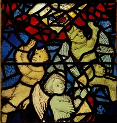 Window depicting devils and an angel