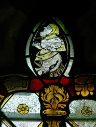 Musician-Grotesque Atop a Canopy