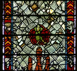 Window w39 depicting a figure amid grisaille