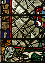 Window w40 depicting a border panel with monkey, lion and a hound; grisaille