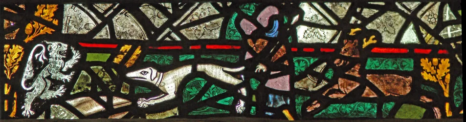 Window w40 depicting a border panel with stag, dog and lion