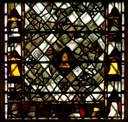 Window w41 depicting a bell and grisaille