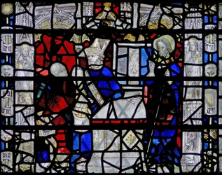 Window depicting a scene from the life of St Nicholas; border with figures